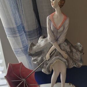 Elegant Silver and Red Figurine